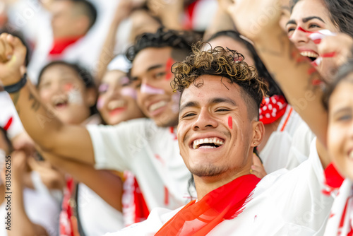 Peruvian football soccer fans in a stadium supporting the national team, La Blanquirroja 
