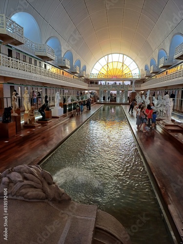 View of La Piscine Museum of Art and Industry, disused public swimming pool built in 1932 in art deco style, reimagined as Museum of Art and Industry, recently extended.