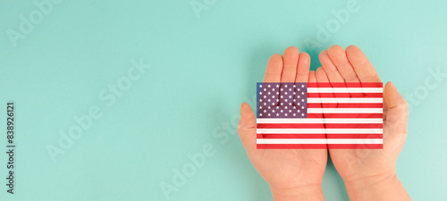 US election, hands holding american flag, citizens of America voting president
