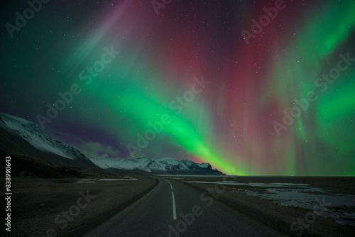 Iceland, road and scenery with Aurora Borealis