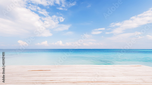 Beautiful beach with wodden jetty and single small tree in Maldives