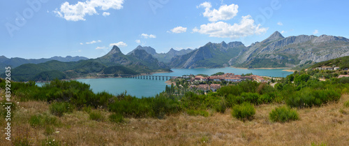 small town of Riaño in beautiful Picos de Europa National Park in Northern Spain with Riaño Lake in the foreground