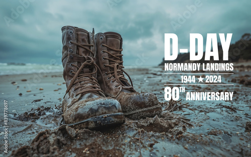 Vintage military boots on normandy beach, a tribute on the 80th anniversary of D-day landings