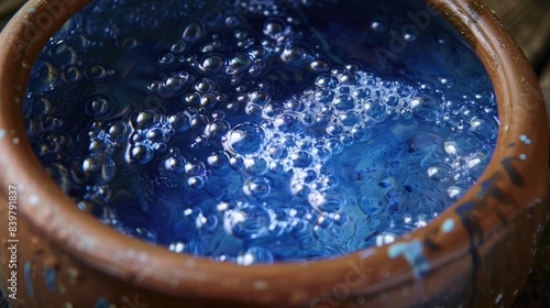 Close up Air bubbles in Indigo water, Indigo plant fermentation in clay pot