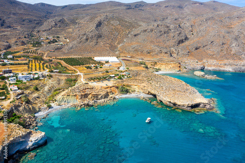 Famous sandy beach of Kalo Nero and Staousa near Makris Gialos, Crete, Greece.