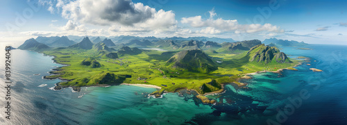 Aerial view of the beautiful Lofoten Islands in Norway, green grassy land and mountains, turquoise sea water with white sandy beaches