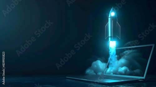 Blue rocket lift off of a laptop on a desktop, concept Faster application, creative idea Startup development and growth