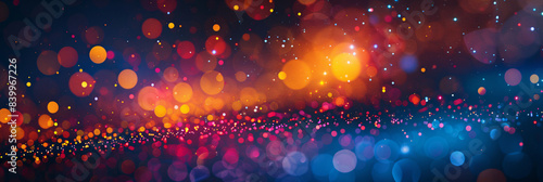 Abstract digital background with glowing dots and light particles in red, blue, orange colors