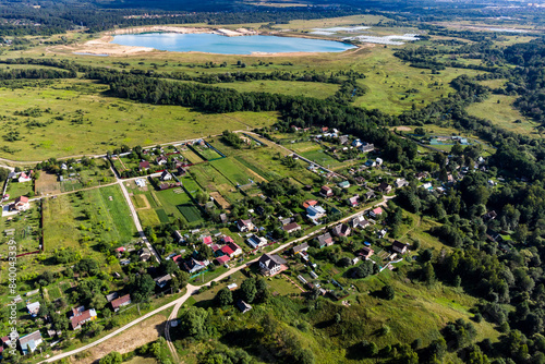 Suburban countryside in flight, view of the village in the foreground