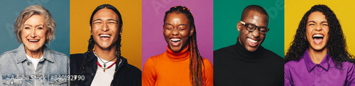 Diverse group of real people laughing in colorful studio portraits