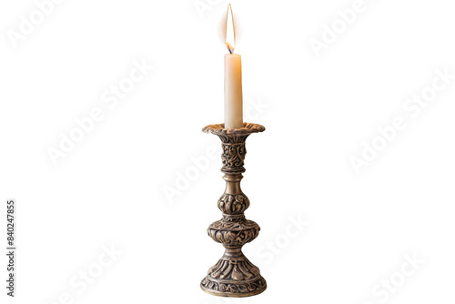 A timeless, ornate antique candlestick holder with a burning candle, emitting warmth and historical charm