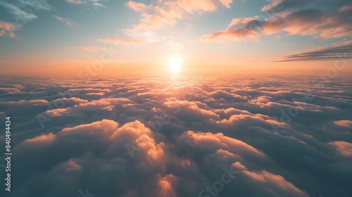 Amazing view of the beautiful sunset above the clouds.