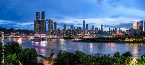 Panoramic view of city skyline and modern buildings in Chongqing at night. Famous city landmarks in China. Panoramic view.