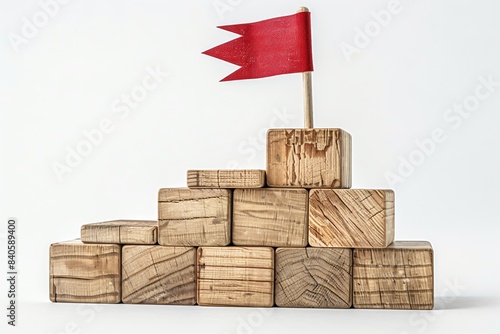 Red flag atop wooden blocks