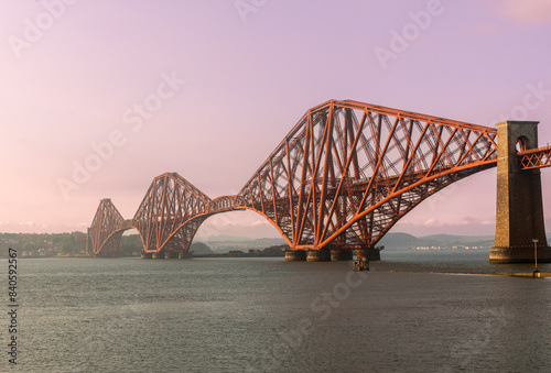 The iconic Forth Bridge, a cantilever railway bridge, spans the Firth of Forth west of central Edinburgh. Completed in 1890, it is a UNESCO World Heritage Site.