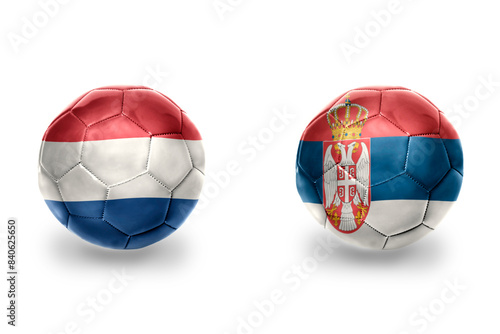 football balls with national flags of serbia and netherlands ,soccer teams. on the white background.