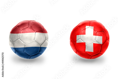 football balls with national flags of switzerland and netherlands ,soccer teams. on the white background.