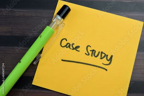 Concept of Case Study write on sticky notes isolated on Wooden Table.