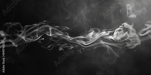 Black and white closeup of incense stick smoke in an abstract image