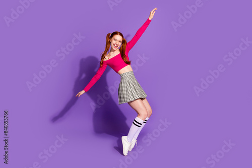 Full length photo of carefree attractive lady dressed off shoulders top having fun empty space isolated violet color background