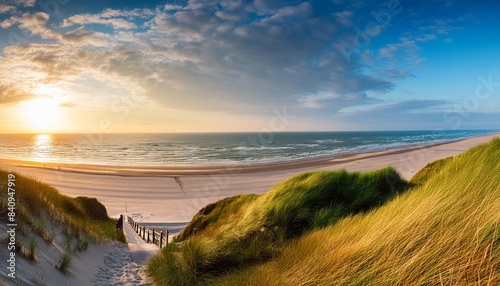 panoramic view of a dune beach at sunset north sea germany