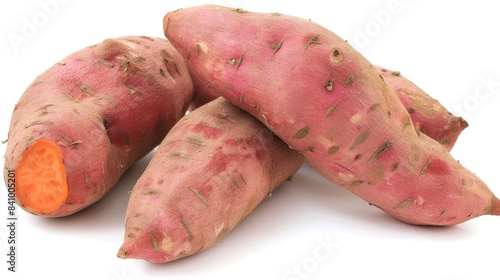 Sweet potatoes are starchy root vegetables with a sweet flavor and orange flesh. 