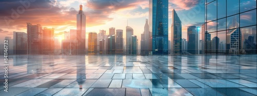 Empty square floor and modern city skyline with buildings at sunset in the city