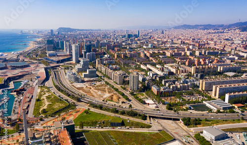 View from drone of Diagonal Mar district on sunny fall day, Barcelona, Spain