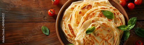 Indian flatbread called Laccha Paratha, made up of layers using wheat flour or maida onthe table