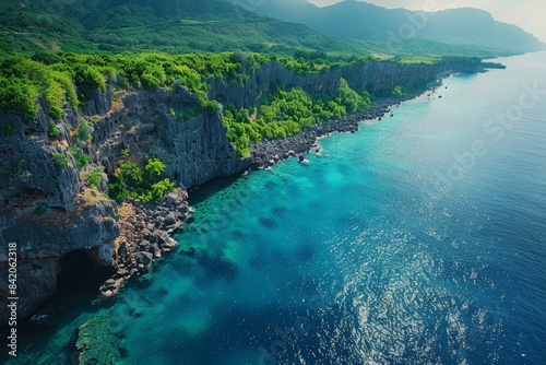 Aerial View of Rocky Coastline with Turquoise Water 