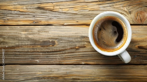 Coffee cup placed on a wooden surface