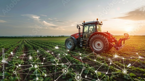 A farmer is using a tractor to plow a field. The tractor is equipped with a variety of sensors that are collecting data about the soil conditions. This data will be used to help the farmer make