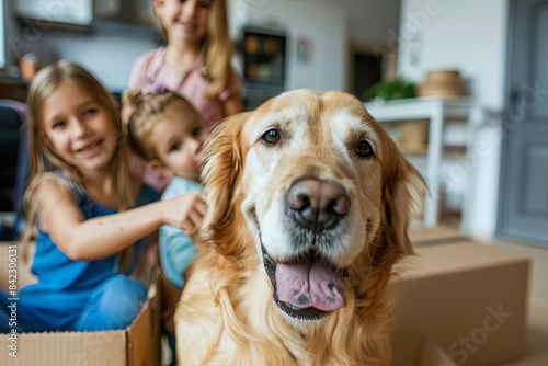 Happy family with kids and dog moving into new apartment