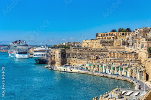 Medieval Malta: Valletta waterfront, Malta, features iconic churches, historic buildings and luxury yachts in Malta. Cultural heritage of Malta