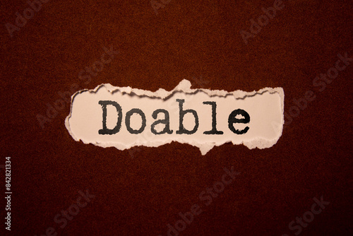 doable colorful word on the wooden background