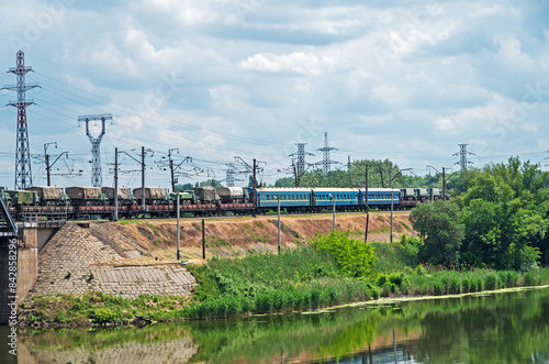 Military train echelon is move out from railway bridge