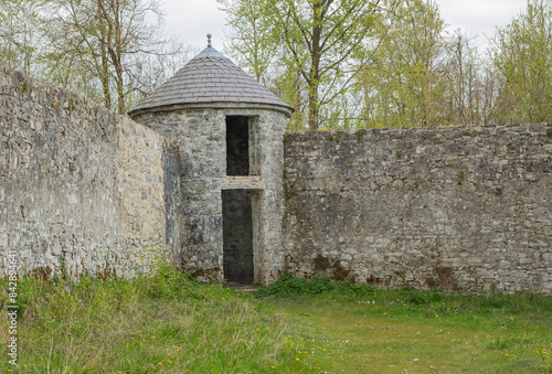 Round dovecote in the corner of a wall