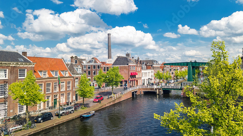 Aerial drone view of Leiden town from above, typical Dutch city skyline with canals and houses, Holland, Netherlands