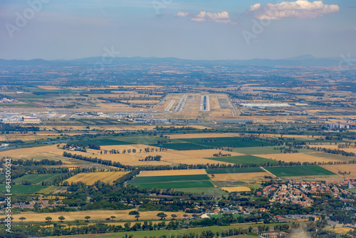 Forward cockpit view of runway at Rome Fiumicino airport in Italy