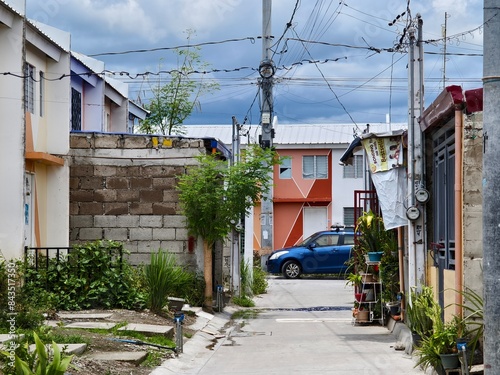 Naic, Cavite, Philippines - Street view of Pasinaya homes, a typical Affordable Social Housing enclave. A typical townhouse subdivision.