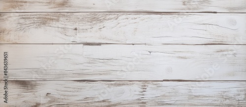 An image of a weathered wooden surface painted in white providing ample space for adding content or graphics