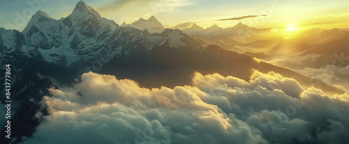 the Himalayas, mountains with snow and clouds, golden hour