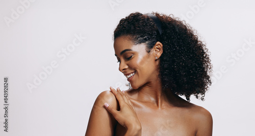 Black woman, natural beauty and skin glow from body care, dermatology and wellness in studio. Cosmetics, facial and smile from skincare and collagen treatment results with white background and mockup