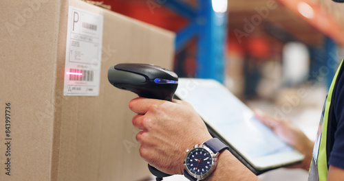 Logistics, hands and man scanning barcode in warehouse with tablet for price or serial number. Cardboard, package and closeup of male cargo worker with digital technology for inventory in storage.