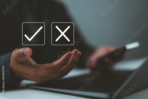 Businessman hands showing checks marks and wrong The idea is to decide to vote. think yes or no Business options for difficult situations true and false symbols