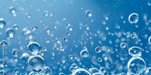 A close-up shot of air bubbles floating in blue water