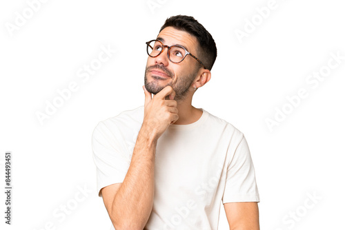 Young handsome caucasian man over isolated chroma key background having doubts