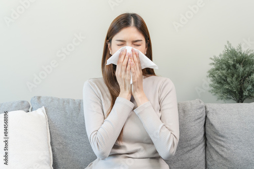 Female unhealthy Sickness, asian young woman, girl unwell and coughing, have cold, sore throat isolated white background suffering with symptom cough feeling bad. Healthcare of Coronavirus, covid-19.