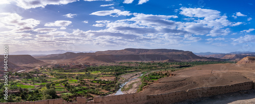 View of Ouarzazate from the Kasbah of Ait Ben Haddou. River dry season.The Berbers built many mud-house Kasbah near the Ait Ben Haddou Gorge, Morocco.