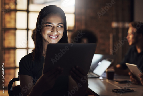 Night, portrait and woman with tablet, smile and research for web designer and person in boardroom. Office, dark and teamwork in company, together and happy for design, online and working in startup